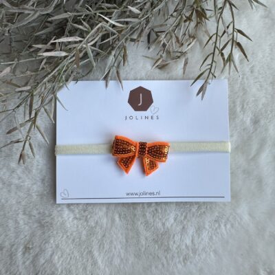 Haarbandje smal met oranje strikje